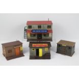 Timpo - A group of four unboxed Wild West themed plastic assembled buildings by Timpo.