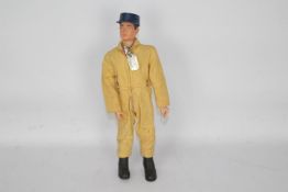 GI Joe, Hasbro - An unboxed vintage GI Joe Pilot action figure.