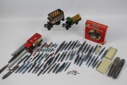 Tri-ang - Minic - Britains - Corgi - A collection of models including a boxed Britains The Queen on