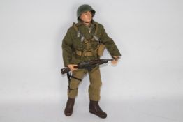 Palitoy, Action Man - An unboxed vintage Palitoy Action Man in Combat Paratrooper outfit.