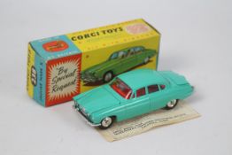 Corgi - Jaguar MkX, sea green body with red interior and spun hubs, luggage in trunk,