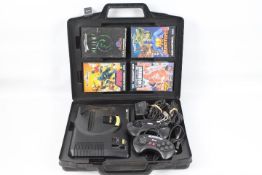 Sega - Mega Drive - A cased Mega Drive Console with two controllers, power leads and 4 games.
