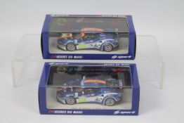 Spark - 2 x Lotus Evora GTE models in Jet Alliance livery from the 2011 Le Mans 24 Hours,
