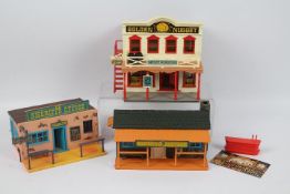 Britains - A trio of unboxed Wild West themed plastic buildings by Britains.