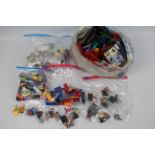 Lego - A mixed lot of various unboxed Lego pieces and characters - Lot includes a Bug's Bunny Lego