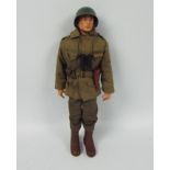 Palitoy, Action Man - A Palitoy Action Man figure in Combat Soldier attire with GI Joe Jacket.