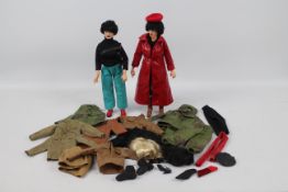 Blue Box - Two unboxed 12" action figures / dolls with a variety of female action figure clothing.