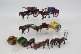 Britains - Charbens - A group of metal Horses and carts including a Charbens milk cart with one