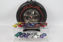 Hot Wheels - Redlines - A Mattel Hot Wheels Rally Wheel Carry Case with 12 x early cars,