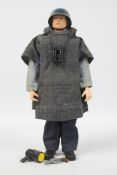 Palitoy, Action Man - A Palitoy dark brown painted hard head Action Man figure in Sailor outfit.