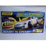 Scalextric - A boxed Scalextric 'Bash 'N Crash' racing set - The #C1259 racing set comes with 2 x