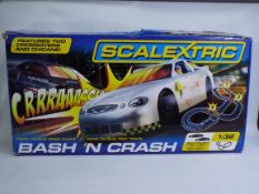 Scalextric - A boxed Scalextric 'Bash 'N Crash' racing set - The #C1259 racing set comes with 2 x