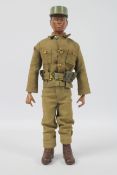 Cotswold Collectables - An unboxed black Action Man type figure by Cotswold Collectables in green