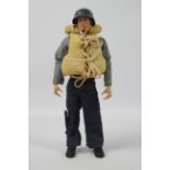 Palitoy, Action Man - A Palitoy red painted hard head Action Man figure in Navy Attack outfit.