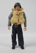 Palitoy, Action Man - A Palitoy red painted hard head Action Man figure in Navy Attack outfit.