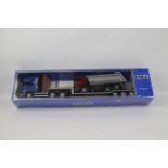 Emek - An unopened 1:25 scale Scania R620 V8 Topline Transporter with Scania P Dump Truck load #