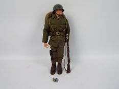 Palitoy, Action Man - A Palitoy Action Man figure in Combat Soldier attire.