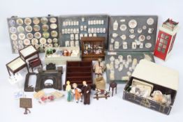 Torbay - Dijon - In excess of 20 miniature dolls house furniture to include: Pottery, Dolls,