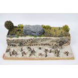 War Diorama - A war diorama set on a beach with a bunker above the beach.