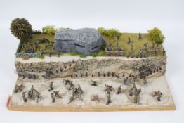 War Diorama - A war diorama set on a beach with a bunker above the beach.