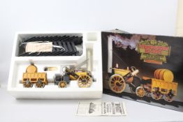 Hornby - A boxed Real Steam Stephensons Rocket # G100-9140 The model shows signs of use and is