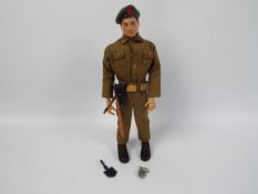 Palitoy, Action Man - A Palitoy Action Man figure wearing Green Beret in combat fatigues.