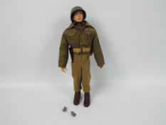 Palitoy, Action Man - A Palitoy Action Man figure in green fatigues.