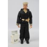 GI Joe, Hasbro - A black painted hard head GI Joe action figure in Shore Patrol outfit.