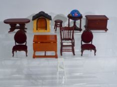 A collection of 10 x boxed pieces of mostly wooden modern doll house furniture - Lot includes a