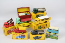 Atlas Dinky - 8 x boxed truck models including Studebaker Tipping Lorry # 25M,