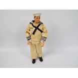Palitoy, Action Man - A dark brown painted hard head Action Man in GI Joe Sailor dress uniform.