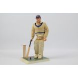 Palitoy, Action Man - A Palitoy dark brown painted hard head Action Man Cricketer.