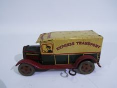 Wells O London - A clockwork tinplate Express Transport van.