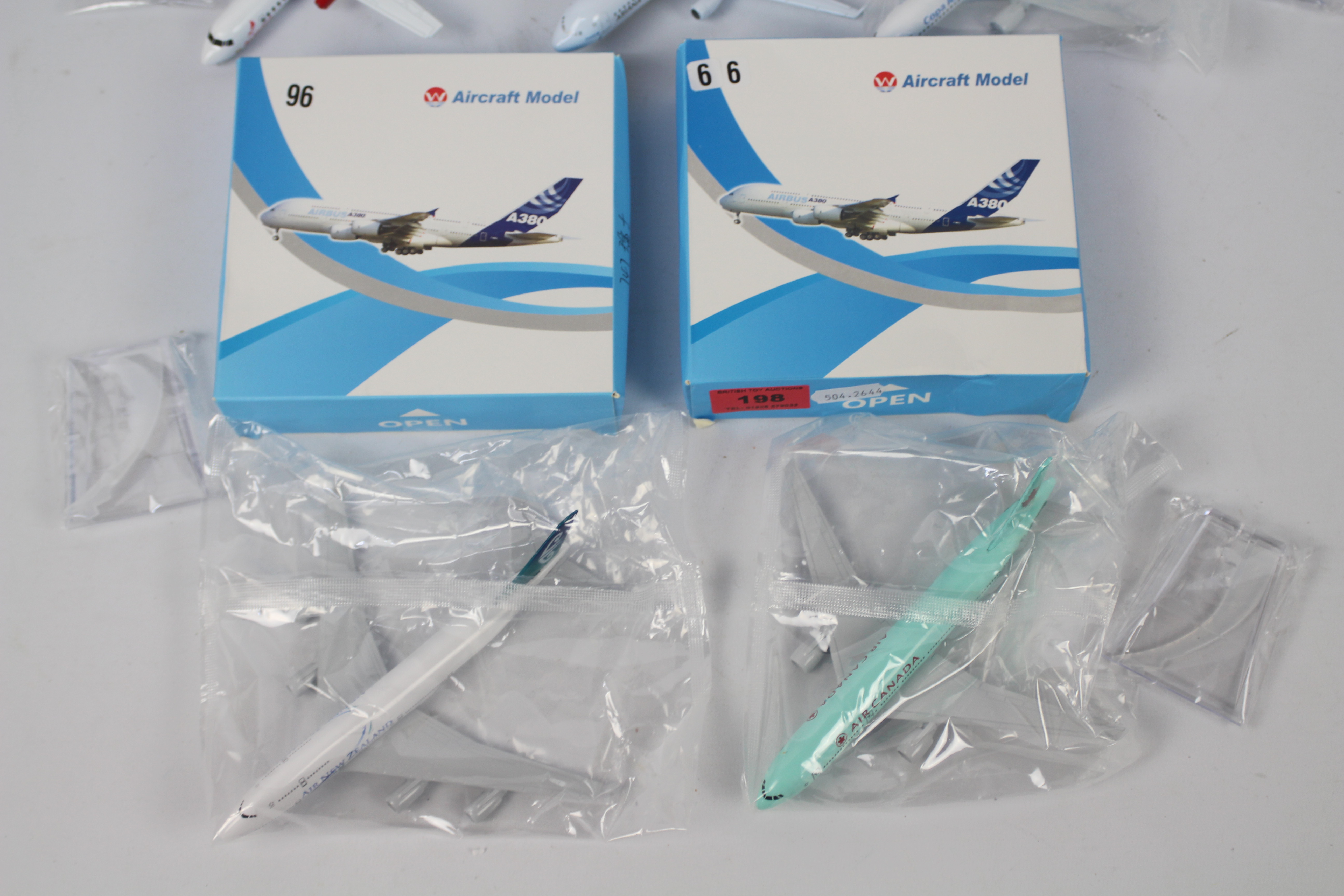 W Aircraft Models - A collection of 5 boxed diecast 1:400 scale model aircraft in various carrier - Image 2 of 4