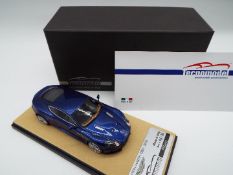 Milano Tecnomodel - a 1:43 scale model Aston Martin DBS, Aviemore blue, silver wheels,