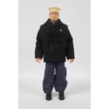 Palitoy, Action Man - A Palitoy black painted hard head Action Man figure in Sailor outfit.
