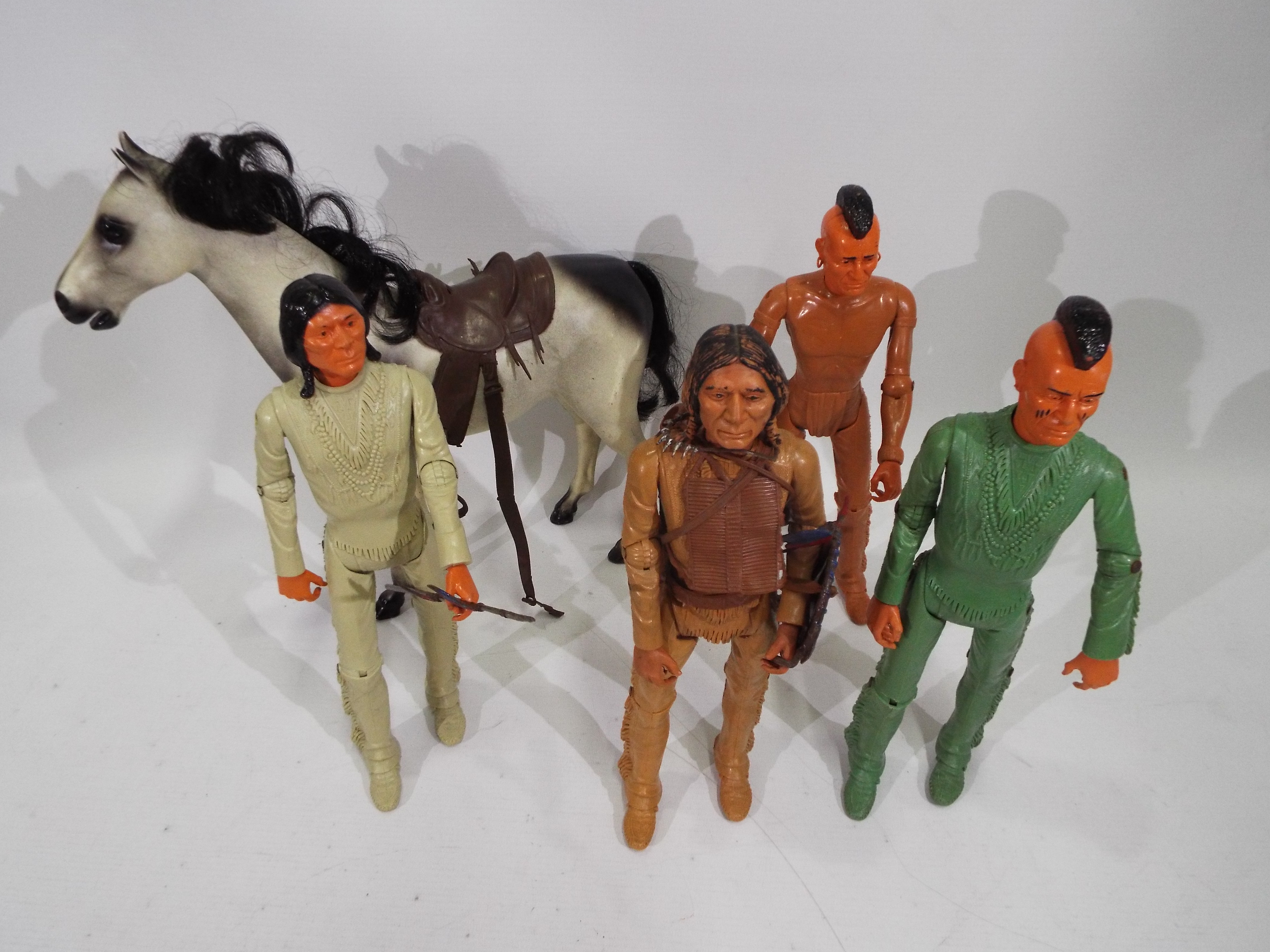 Marx, Johnny West - Four unboxed Marx 'Best of the West' 12" action figures with an unboxed horse.