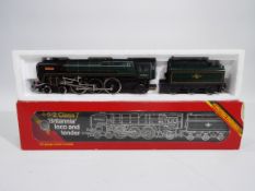 Hornby - A boxed Hornby R063 OO gauge Class 7 4-6-2 steam locomotive and tender, Op.No.