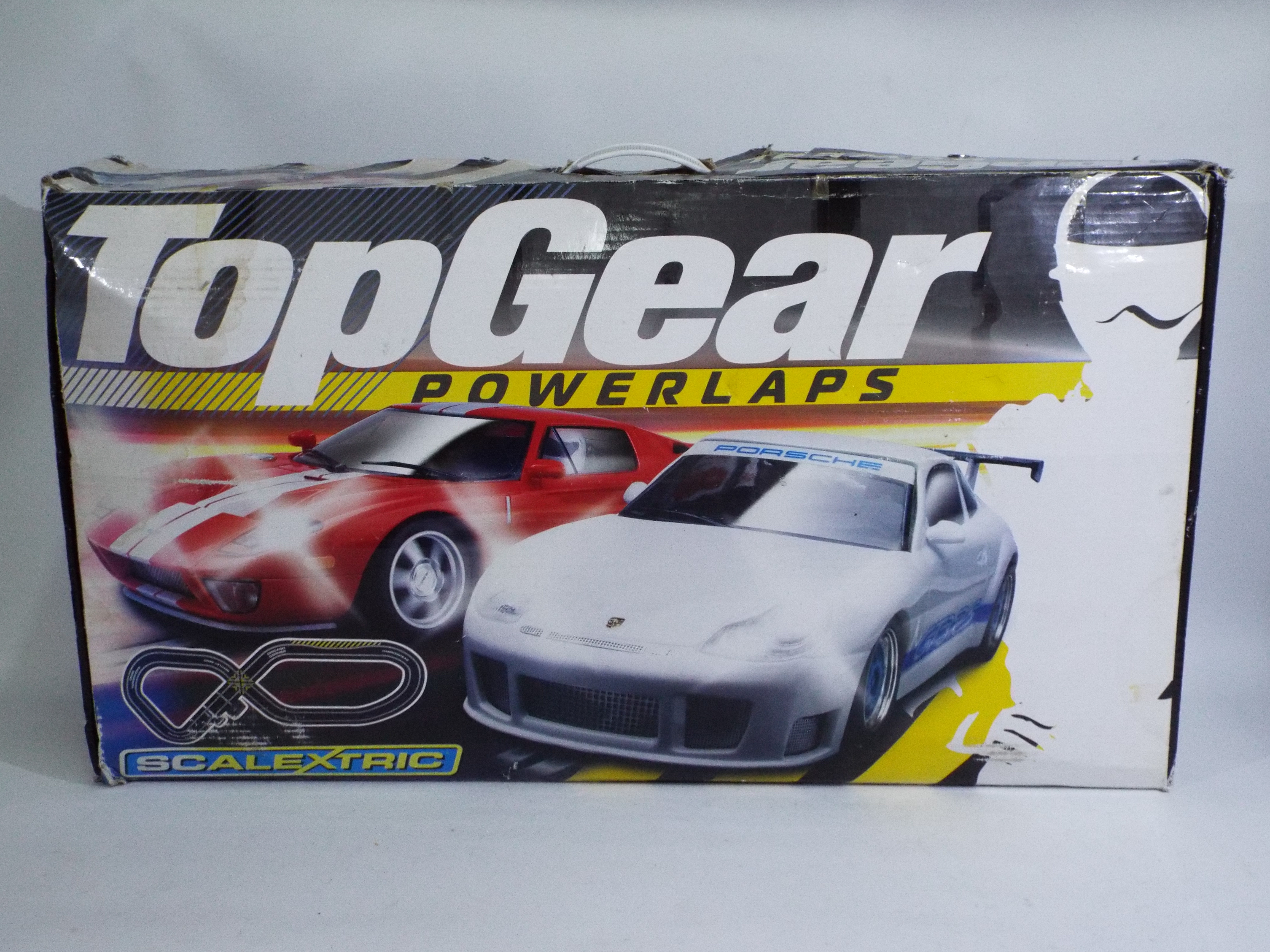 Scalextric - A boxed Scalextric Top Gear Power Laps racing set - The #C1218 racing set comes with