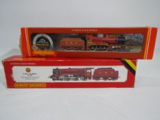 Hornby - Two boxed OO gauge steam locomotives and tenders from Hornby.