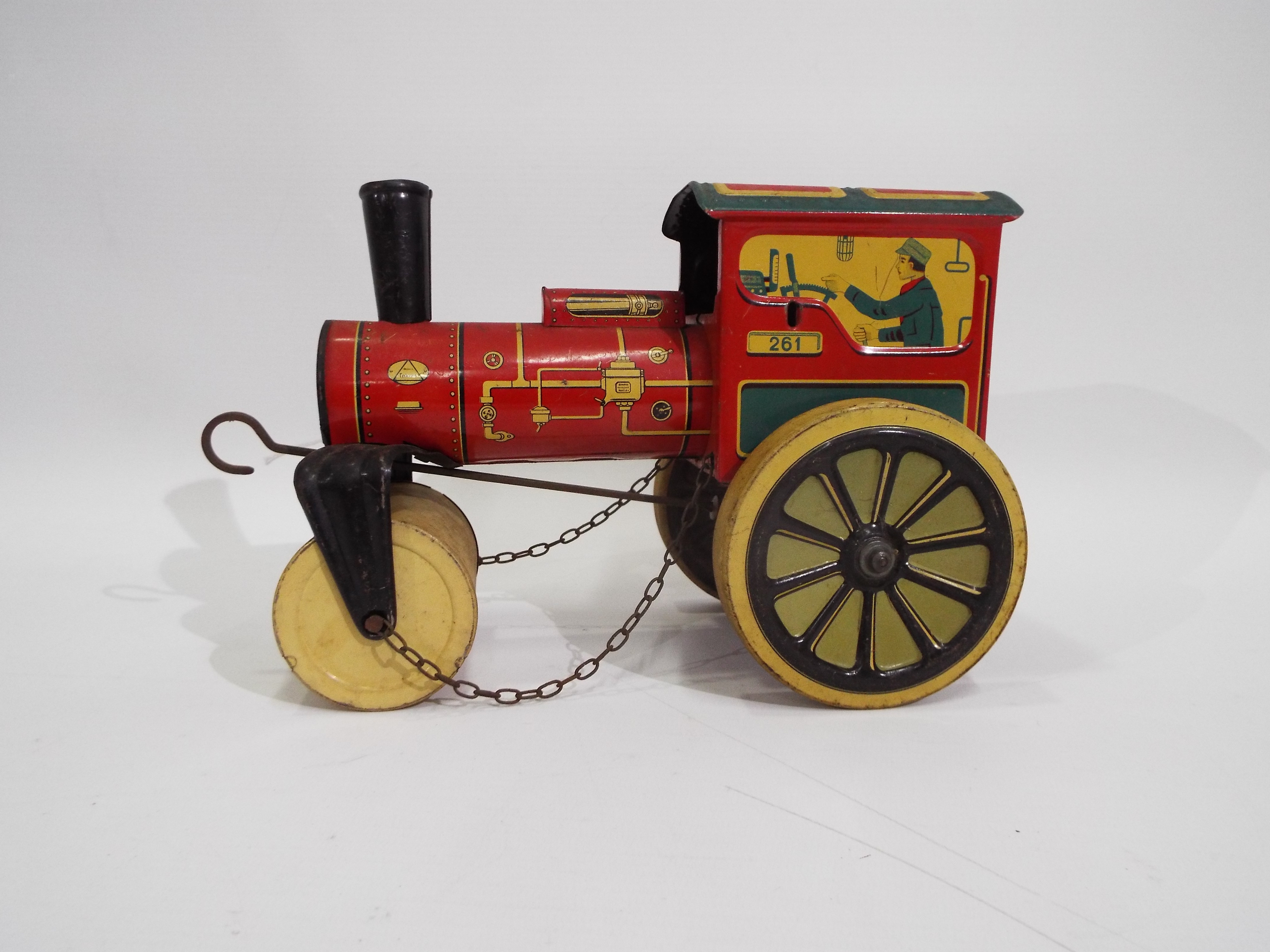 DGM - A vintage clockwork tinplate Steam Roller marked D.G.M. D.P. made in U.S.-Zone Germany.