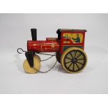 DGM - A vintage clockwork tinplate Steam Roller marked D.G.M. D.P. made in U.S.-Zone Germany.