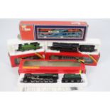 Hornby, Lima - Three boxed OO gauge Hornby locomotives and a boxed Lima OO gauge car transporter.