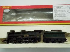 Hornby - an OO gauge model Castle class 4-6-0 locomotive and tender, running no 5053 'Earl Cairns',