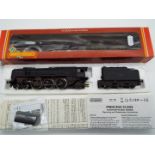 Hornby - an OO gauge model Britannia class 4-6-2 locomotive and tender,