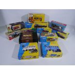 Corgi - 12 boxed diecast model vehicles from several Corgi ranges.