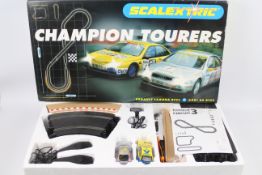 Scalextric - A boxed Scalextric C.1221 Champion Tourers Set.