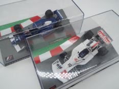 F1 Formula One - two 1:43 scale models comprising Tyrrell Ford # 019 1990 as driven by Jean Alesi,