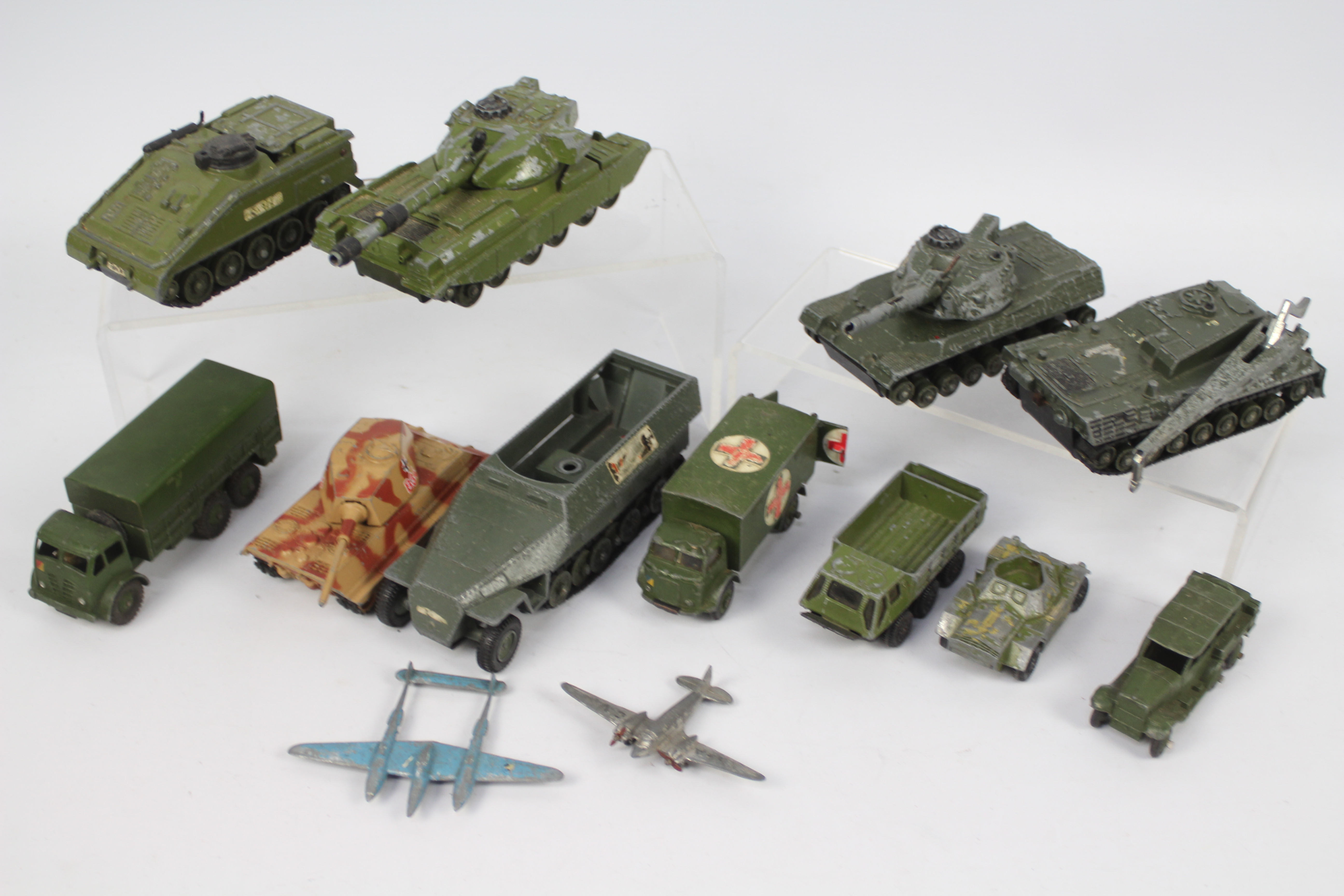 Dinky Toys, Corgi - An unboxed and playworn collection of mainly military diecast model vehicles.