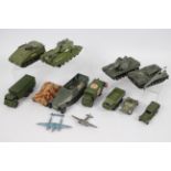 Dinky Toys, Corgi - An unboxed and playworn collection of mainly military diecast model vehicles.